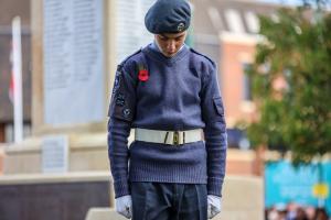 Remembrance Sunday. A cadette paying respects.