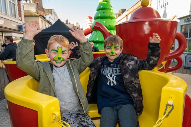 Kids on the teacups at the Welcome Back