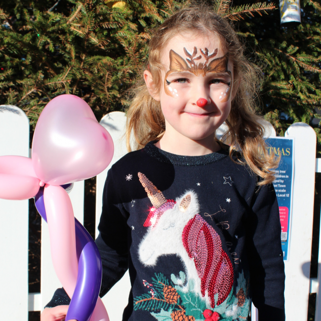 A girl at the Love Local Christmas Fun Day event 