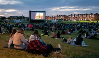 crowd of people watching aladdin
